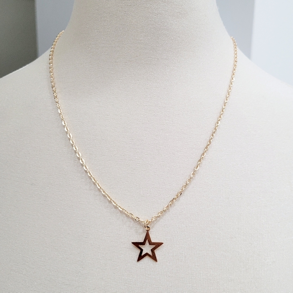 Brand New Gold Tone Star Necklace
